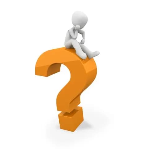 man sitting on question mark