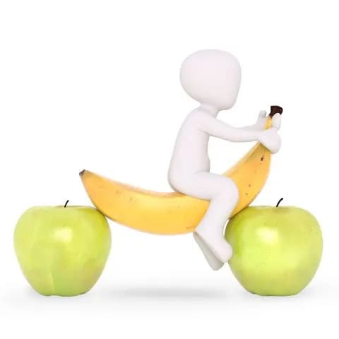 sitting on a huge banana between green a